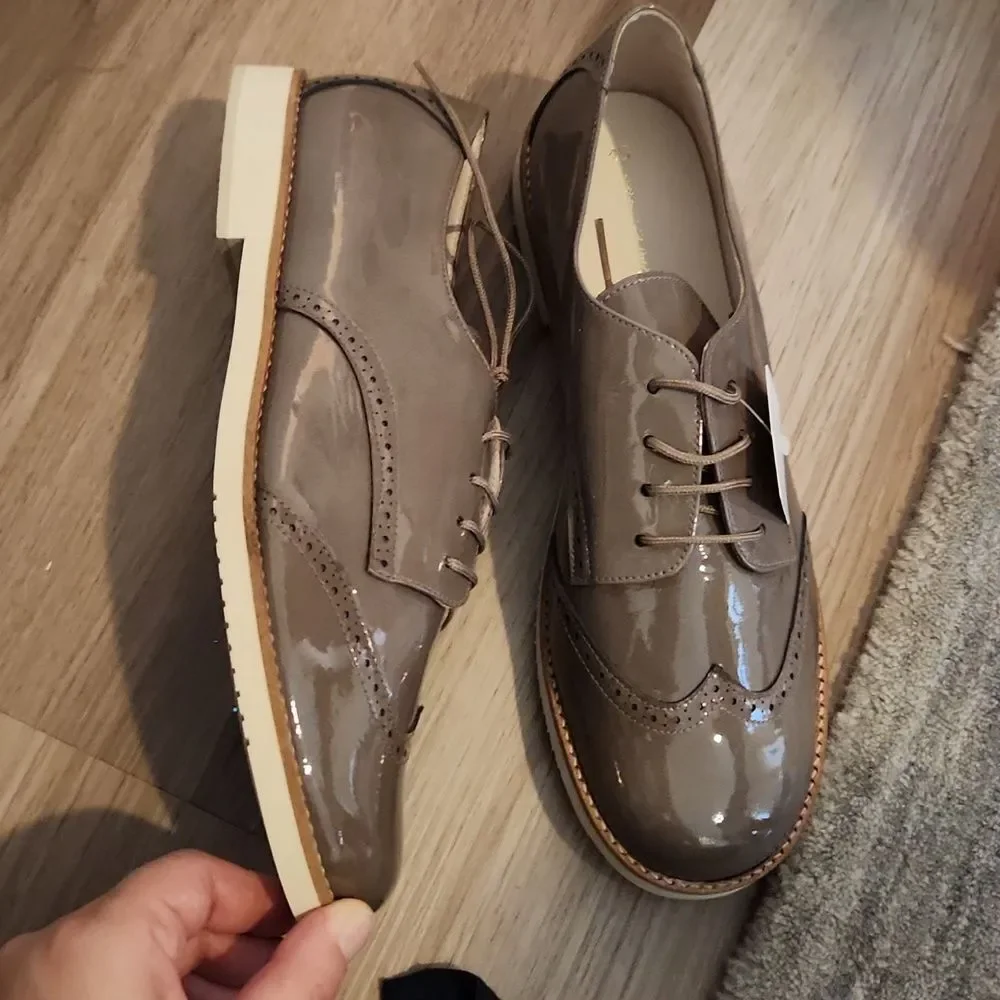 Brown patent leather dress shoes